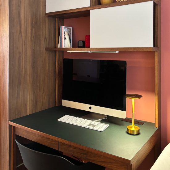 Walnut shelves with Forbo sliding sides for a family desk